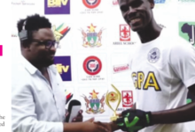 • Luke Damalie (right) receiving his MVP award