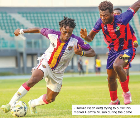 • Hamza Issah (left) trying to outwit his marker Hamza Musah during the game