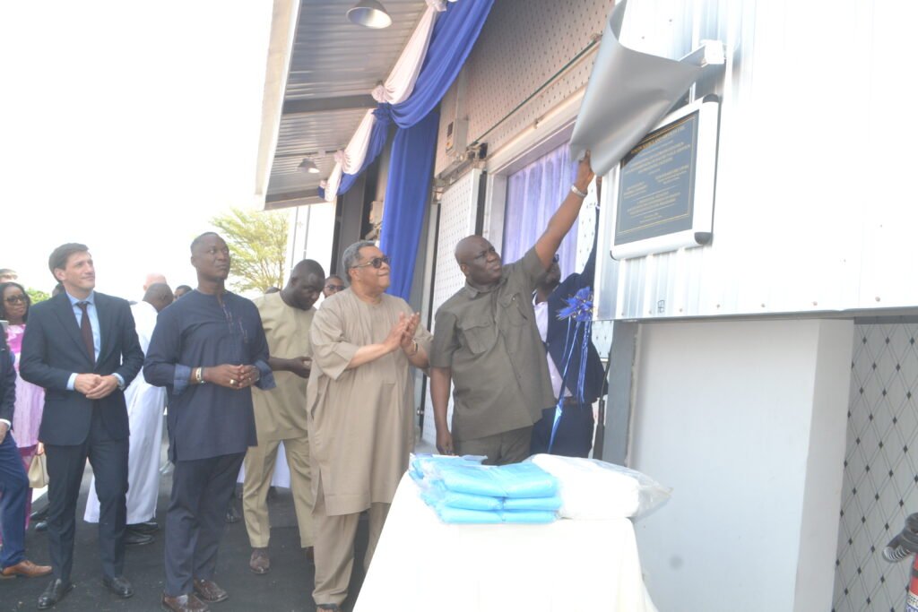Mr Opoku (right) unveiling the plaque of the facility. With him are Mr Kpeglar(second from left), Mr Tanoh (second from right), and Mr Landshoft Photo Victor A. Buxton