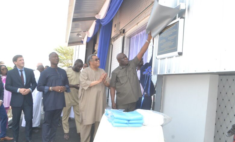 Mr Opoku (right) unveiling the plaque of the facility. With him are Mr Kpeglar(second from left), Mr Tanoh (second from right), and Mr Landshoft Photo Victor A. Buxton