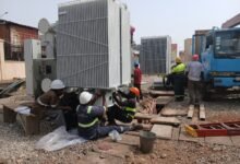 ECG workers working on the substation transformer