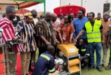 Ms. Aurore Rusiga,(fourth from right) symbolically handling over the equipment to Mr Eric Opoku (third from left) at the launch