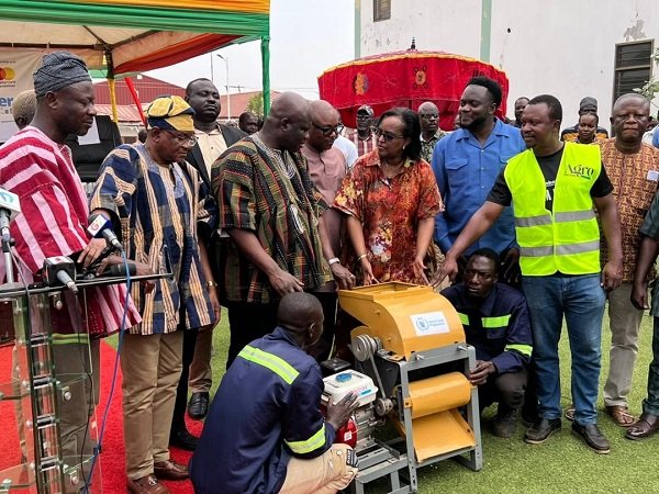 Ms. Aurore Rusiga,(fourth from right) symbolically handling over the equipment to Mr Eric Opoku (third from left) at the launch