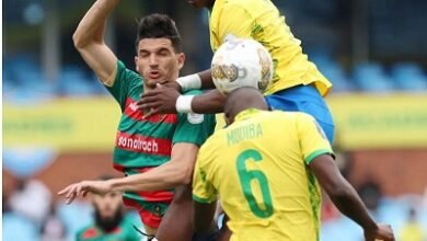 An aerial challenge between players of Sundowns (in yellow) and MC Alger