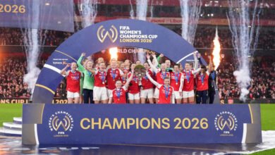 Arsenal lifting the Champions Cup trophy