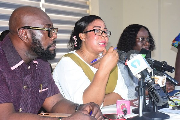 Ms Linda Ocloo (middle) addressing the media Photo Seth Osabukle