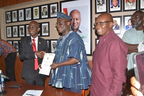 Mr Nketia (left) presenting the report to Mr Ibrahim Photo Victor A. Buxton