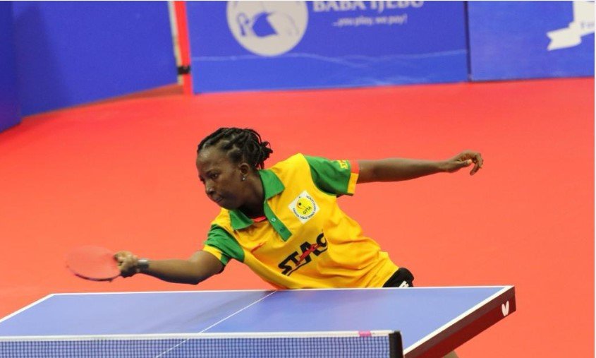 Cynthia Kwabi returns a serve in the final match