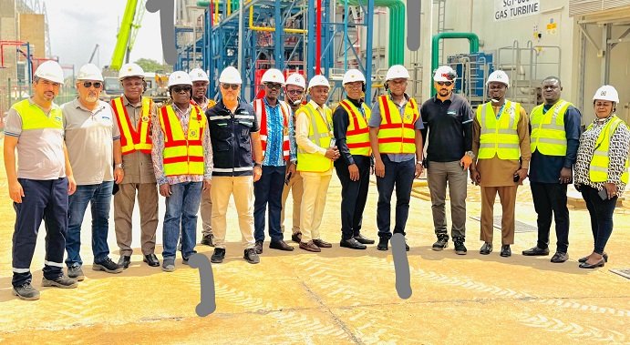 ECG CWM Pix----- Dr Amuna (fourth from left) with Mr Kpekpena and management of Aksa Energy