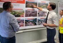 Mr Landshoft (right) being briefed on the project