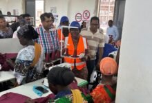 Mrs Elizabeth Ofosu Adjare and other dignitaries inspecting the factory during her visits