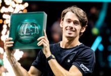 Felix Auger-Aliassime with his title