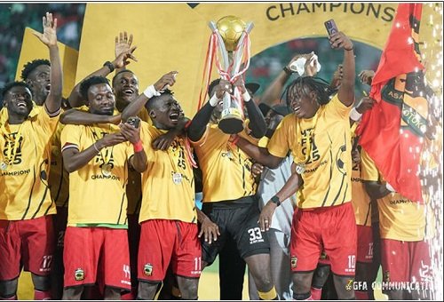 Flashback Asante Kotoko players celebrating with last season's trophy