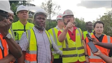 Mr Adjei (second from left) being briefed by Mr Falup at the Daboase Treatment plant project