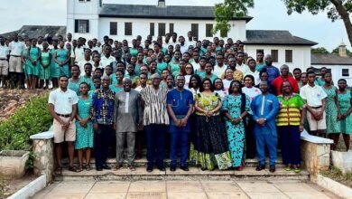 Mrs Maame Efua Houadjeto (middle) with officials from the Authority, students and teachers of the School after the event