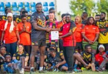 • General Manager, Jafaru Awudu Mustapha, presenting Coach Nasiru Aminu (Zaakie) with his Level 1 coach accreditation certificate at the 2025 Tri Nation in Ghana
