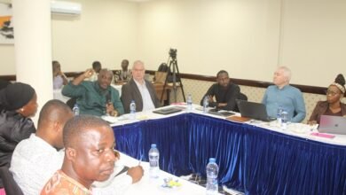 Mr Peter Dery (with mic) addressing participants at the meeting. Photo. Ebo Gorman