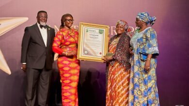 Joyce Bawa Mongtari (second from left) presenting the citation to one of the awardees
