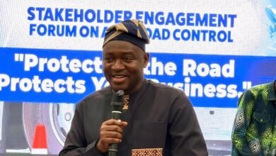 • Mr Suhuyini (inset) addressing the participants at the event