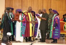 President Mahama (infront) about to honour Ibrahim Mahama with the honorary degree