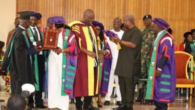 President Mahama (infront) about to honour Ibrahim Mahama with the honorary degree