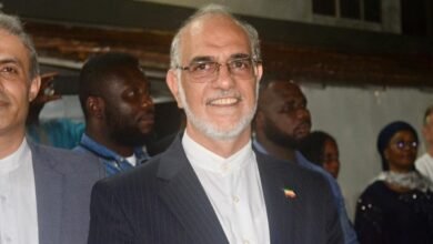 Mr Ali Ghomshi (inset) speaking to some dignitaries at the event