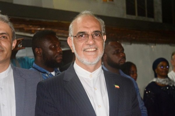 Mr Ali Ghomshi (inset) speaking to some dignitaries at the event