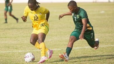 Ivy Owusu Ansah controls the ball away from Khwezi Khoza Photo Raymond Ackumey