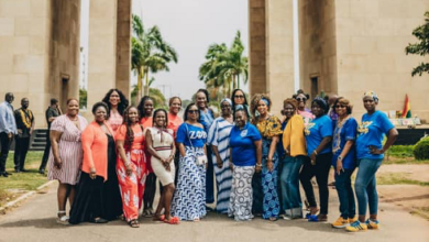 • Some tourists at the Black Star Square