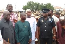 -Mr Opoku (second from left) at the the Cattle market