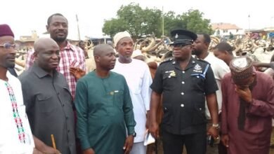 -Mr Opoku (second from left) at the the Cattle market