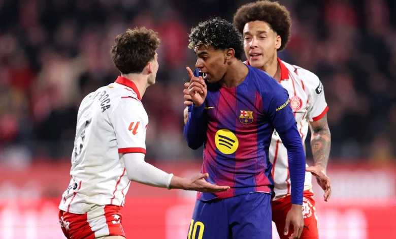 Lamine Yamal (center) in an altercation with Girona players during the game