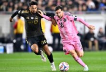Messi (10) moves the ball against Los Angeles FC’s Mathieu Choinière (66) during the second half at Los Angeles Memorial Coliseum