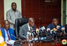 • Mr Opoku (middle), speaking at the press conference
