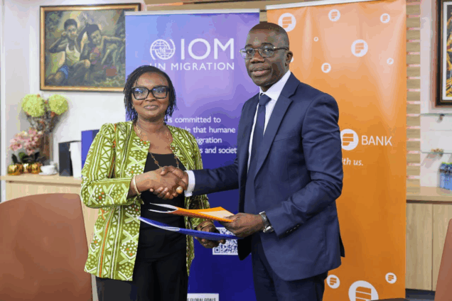 Ms Ndiaye (left) exchanging the signed document with Mr Opuni
