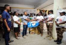 Chief Supt. of Prisons, Sherrita Martha Quist (right) presenting the items to Dr Richard Letsa (left) rep from Nsawam Government Hospital