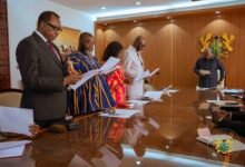President Mahama (right) swearing in NAPRM Board Members
