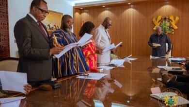 President Mahama (right) swearing in NAPRM Board Members