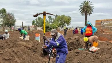 People dig for gold outside Springs, South Africa