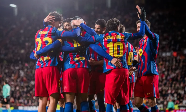 • Players of Barcelona celebrating the second goal