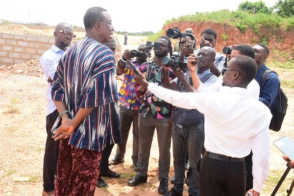 • Mr Okley (left) briefing the media at the site Photo: Seth Osabukle