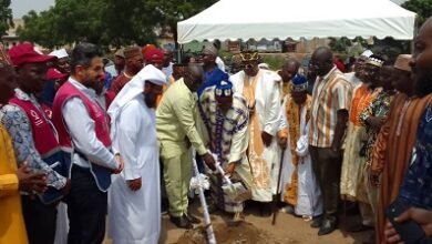Alhaji Faila (fifth from left) breaking grounds for the commencement of the projects