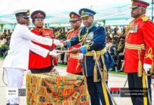 JUO Abayateye(left) receiving his award from President Mahama