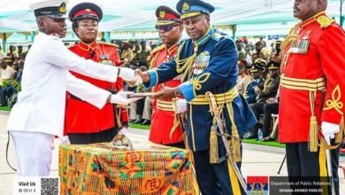 JUO Abayateye(left) receiving his award from President Mahama