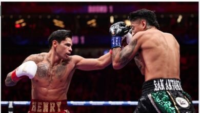 Ryan Garcia throws a punch at Mario Barrios during their WBC welterweight title fight at T-Mobile Arena in Las Vegas on Saturday.