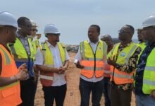 Mr Adjei (right) being briefed about the ongoing project