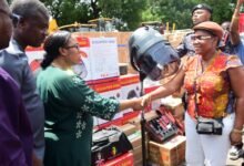 Ms linda Ocloo (second from left) presenting some of the items to Mrs Brown Akuyo Photo Seth Osabukle
