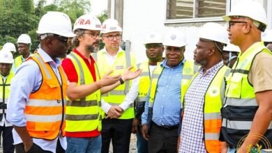 : Mr Kenneth Adjei (second from right) being briefed at the project site