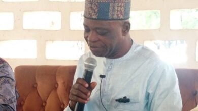 Mr Ali Adolf John Mburidiba (inset) addressing the stakeholde