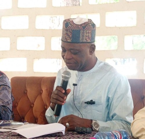 Mr Ali Adolf John Mburidiba (inset) addressing the stakeholde